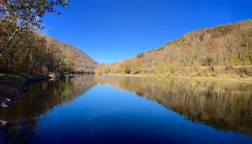 The sky and New River are the same shade of deep blue in this picture from the Stone Cliff Trail. 