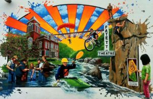 The first exterior mural in Fayetteville was done by Rob Cleland.