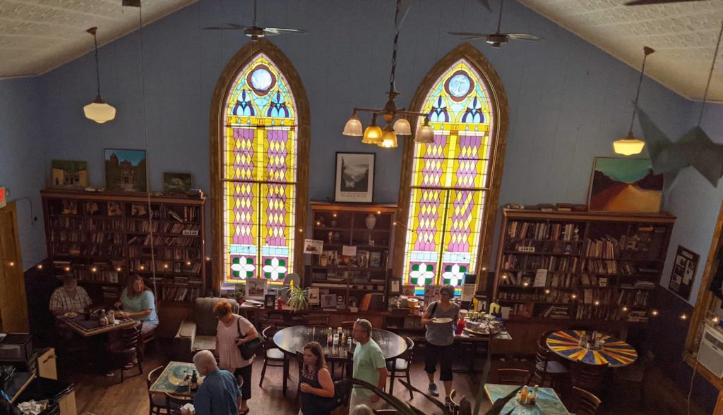 The two huge stained-glass windows in Cathedral Cafe, an old church turned coffeeshop and cafe. 