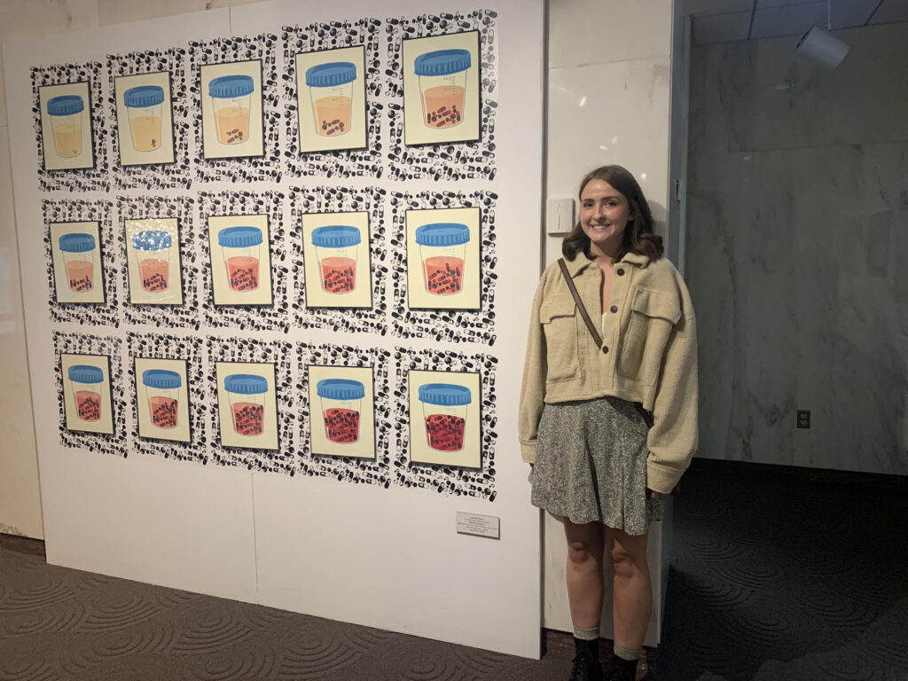 Linday with her assemblage of prints that won the 2021 Governor's Award at the Biennial WV Juried Exhibit in Charleston. 
